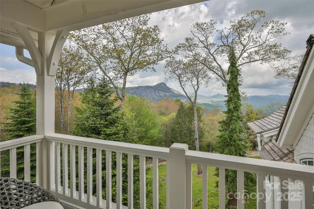 a view of a trees in a balcony