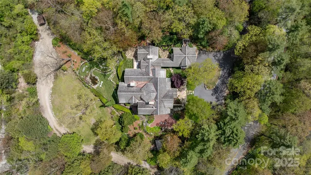 an aerial view of residential house with outdoor space