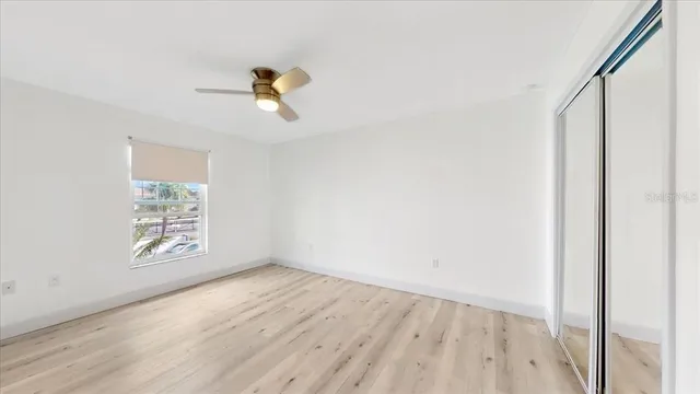 a view of an empty room and window