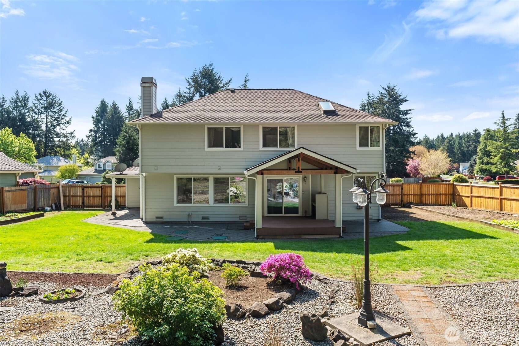 9536 Marlbrook Loop Southeast Olympia, WA 98513 - Photo 39 of 40 a front view of a house with garden