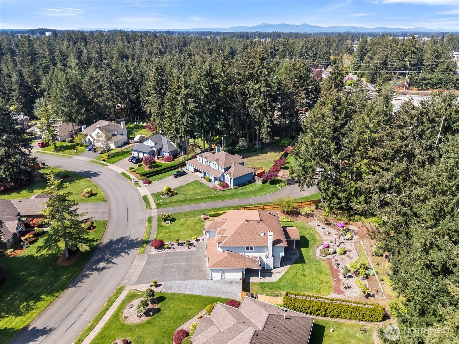 9536 Marlbrook Loop Southeast Olympia, WA 98513 - Photo 6 of 40 an aerial view of a golf course with chairs