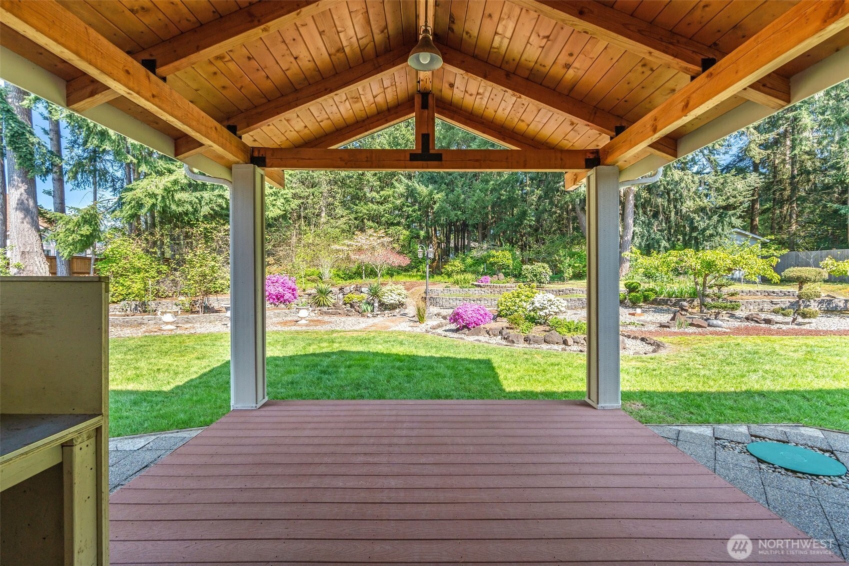 9536 Marlbrook Loop Southeast Olympia, WA 98513 - Photo 7 of 40 a patio with a yard table and chairs