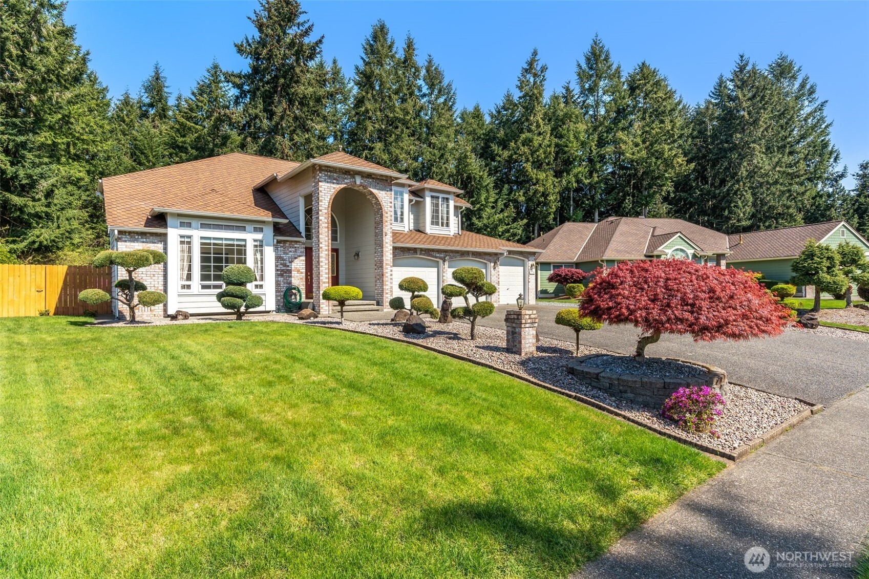 9536 Marlbrook Loop Southeast Olympia, WA 98513 - Photo 10 of 40 a front view of a house with garden