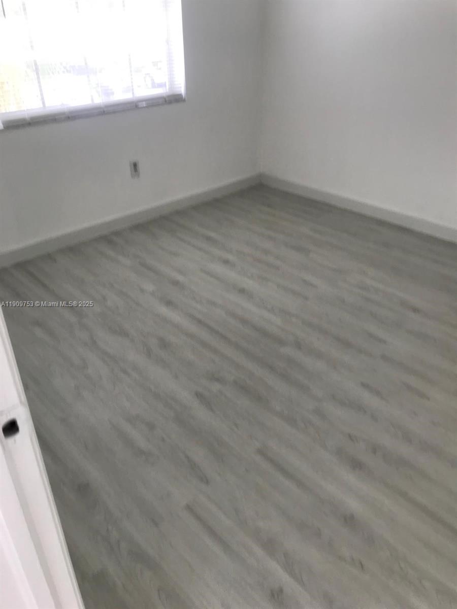 438 Northeast 210th Cir Terrace, Unit 2034B Miami, FL 33179 - Photo 19 of 20 a view of room