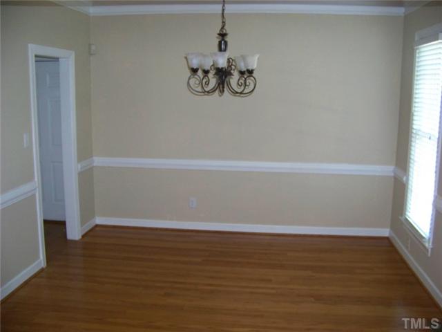 2629 Jasper Lane Raleigh, NC 27613 - Photo 2 of 7 a view of room with window and wooden floor