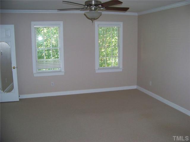 2629 Jasper Lane Raleigh, NC 27613 - Photo 5 of 7 an empty room with a window