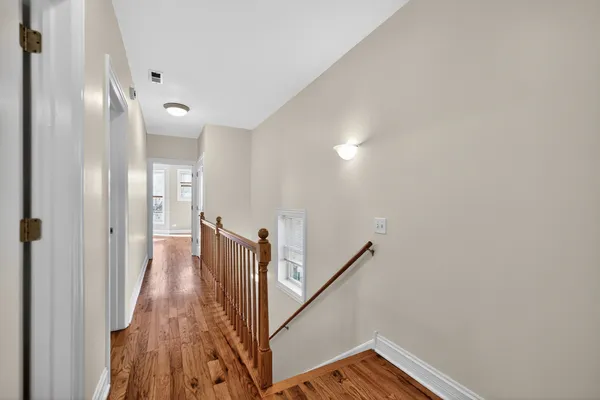 a view of a hallway with entryway