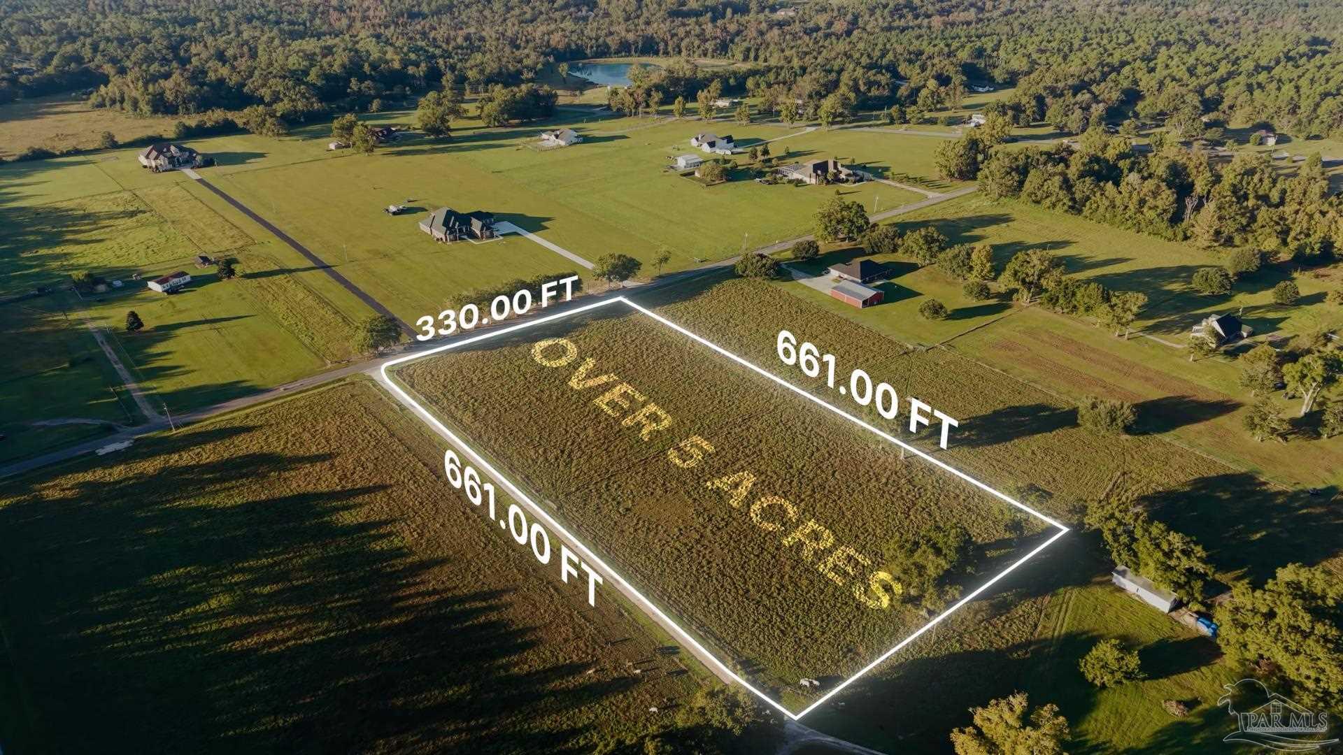 400 Meharg Road, Unit LOT C Molino, FL 32577 - Photo 4 of 4 an aerial view of a city