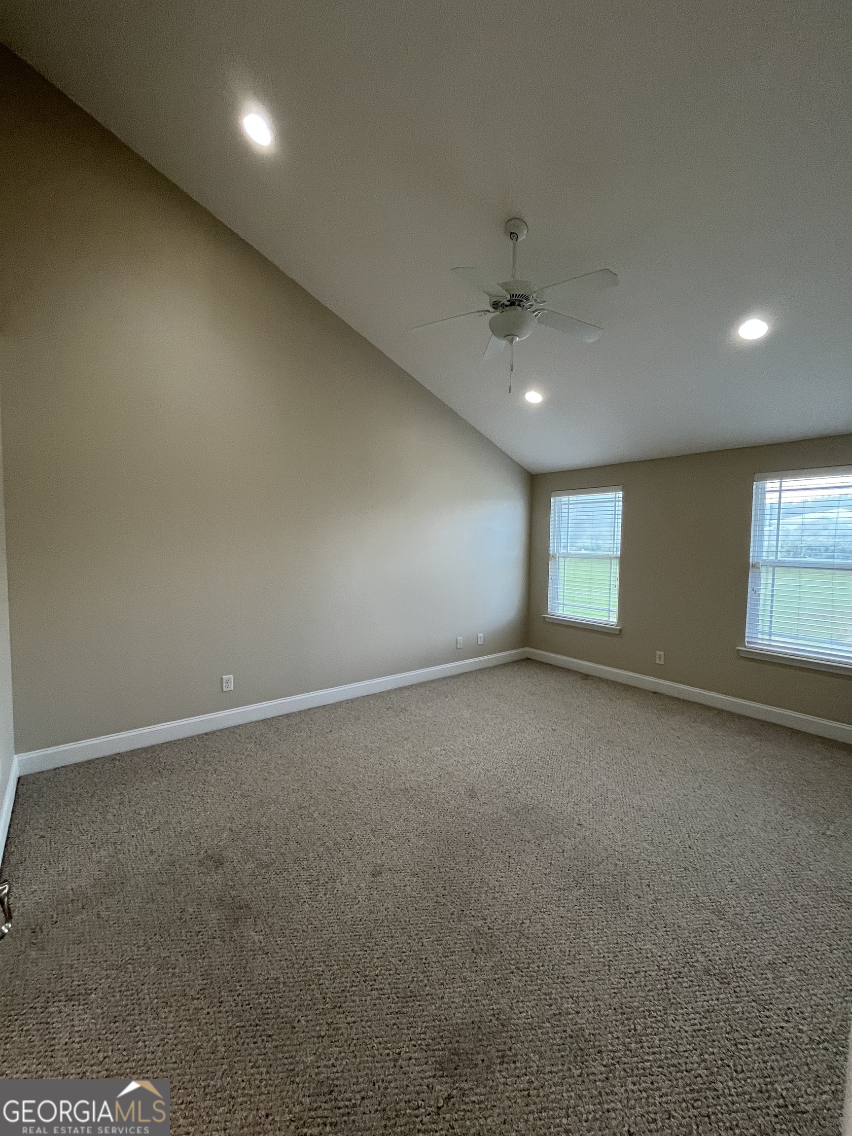 17 Fox Path St. Marys, GA 31558 - Photo 15 of 23 an empty room with a empty space and windows