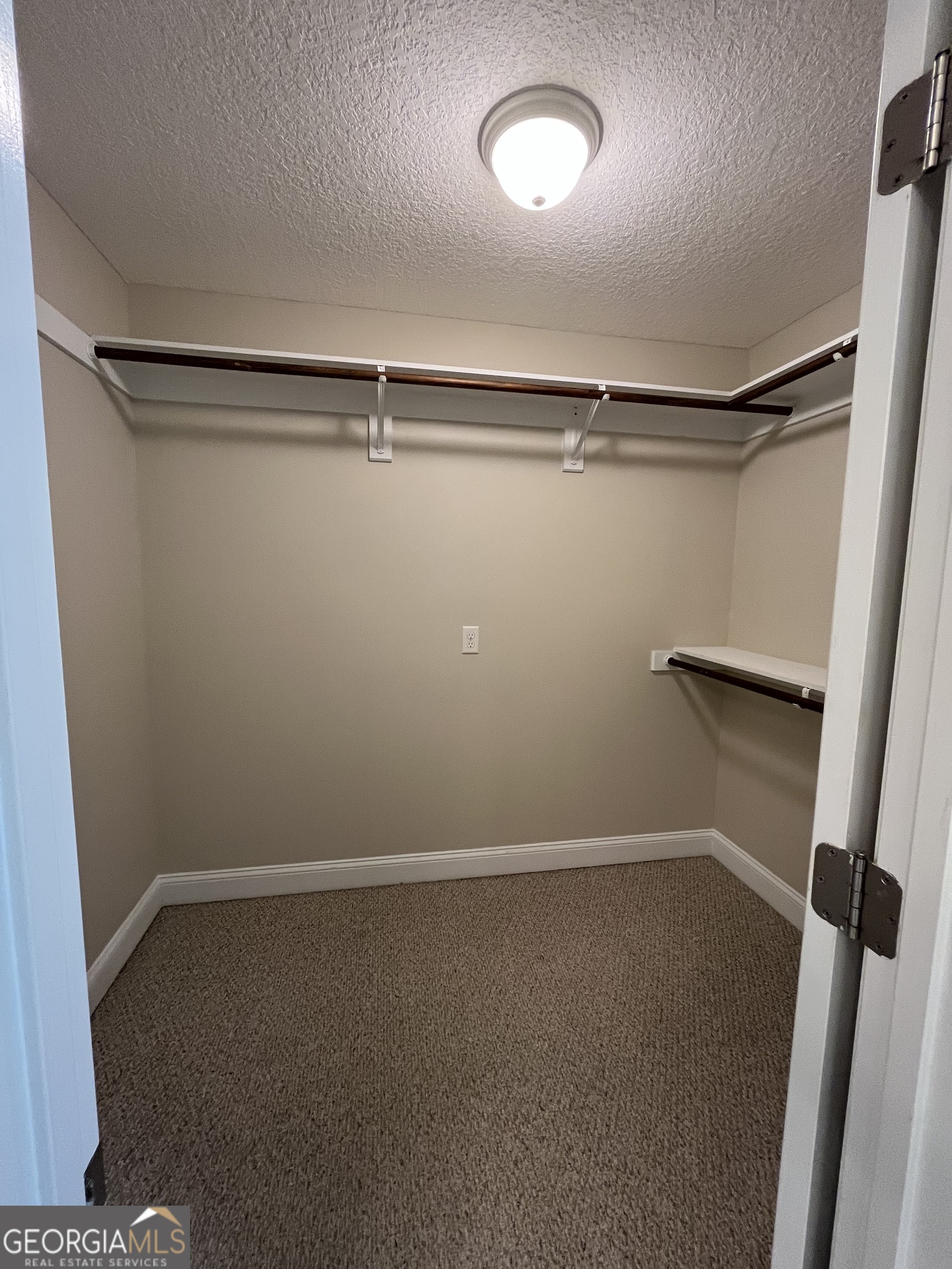 17 Fox Path St. Marys, GA 31558 - Photo 21 of 23 a view of a room with racks on the wall