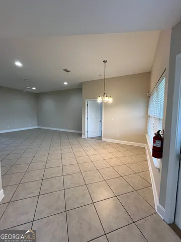 a view of a livingroom with a furniture
