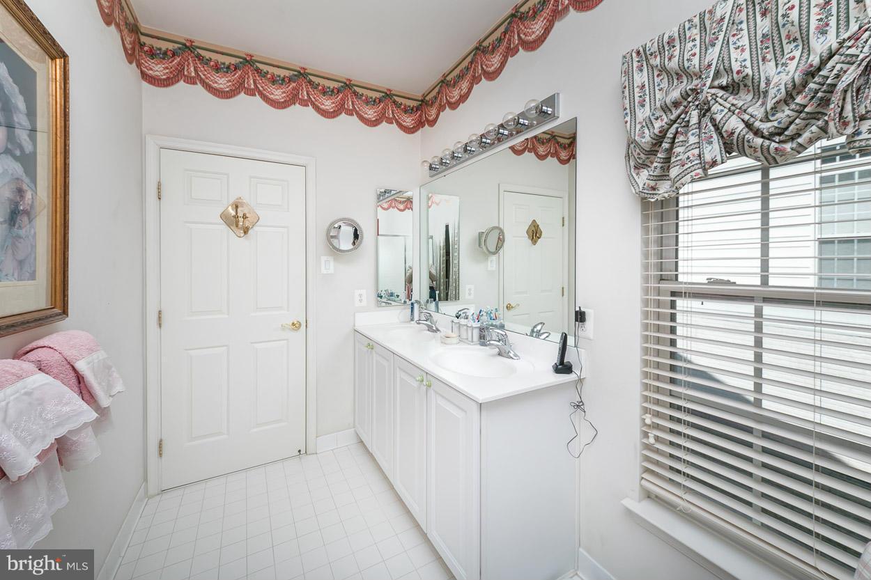 8605 Snowreath Road, Unit 8605 Pikesville, MD 21208 - Photo 15 of 30 Bright master bath