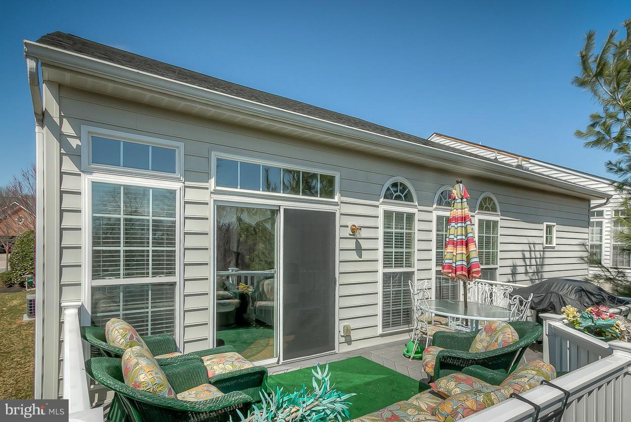 8605 Snowreath Road, Unit 8605 Pikesville, MD 21208 - Photo 25 of 30 Enlarged deck off sun room!