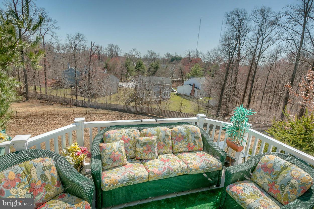 8605 Snowreath Road, Unit 8605 Pikesville, MD 21208 - Photo 28 of 30 Pretty Maintenance free deck.