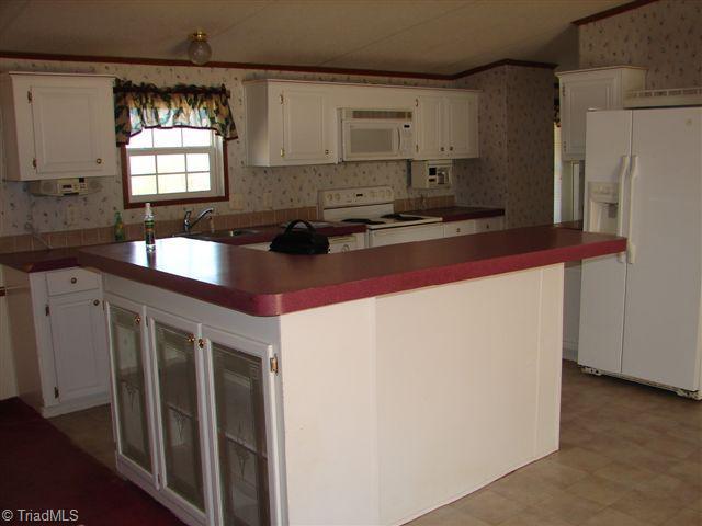 7089 Brantley Gordon Road Denton, NC 27239 - Photo 8 of 16 Kitchen. with built-in and Island
