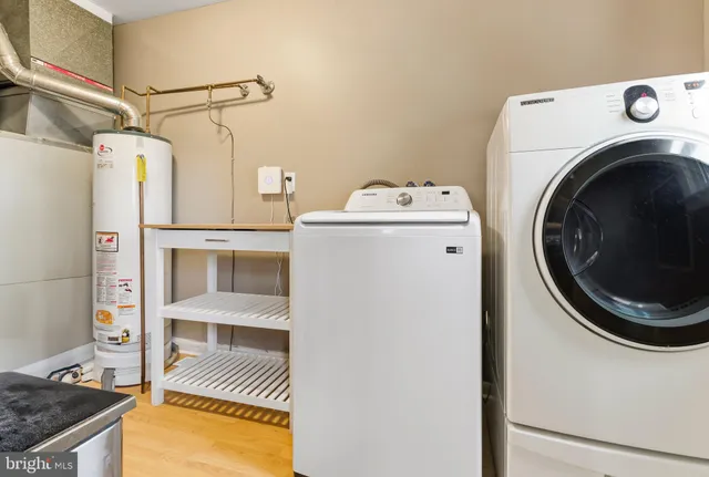 a utility room with dryer and washer