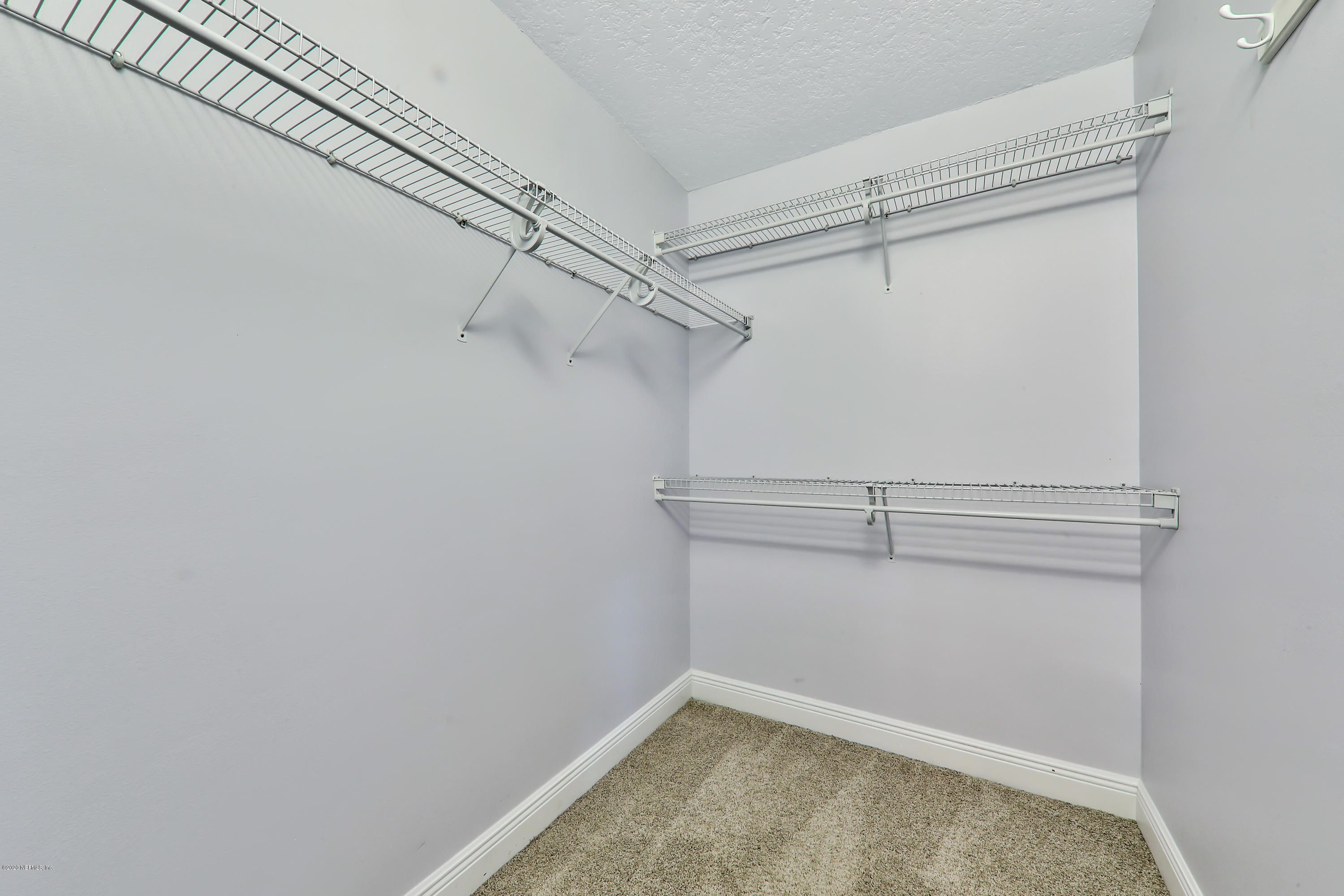 3289 Kings Road South St. Augustine, FL 32086 - Photo 12 of 41 a view of a room with racks on the wall