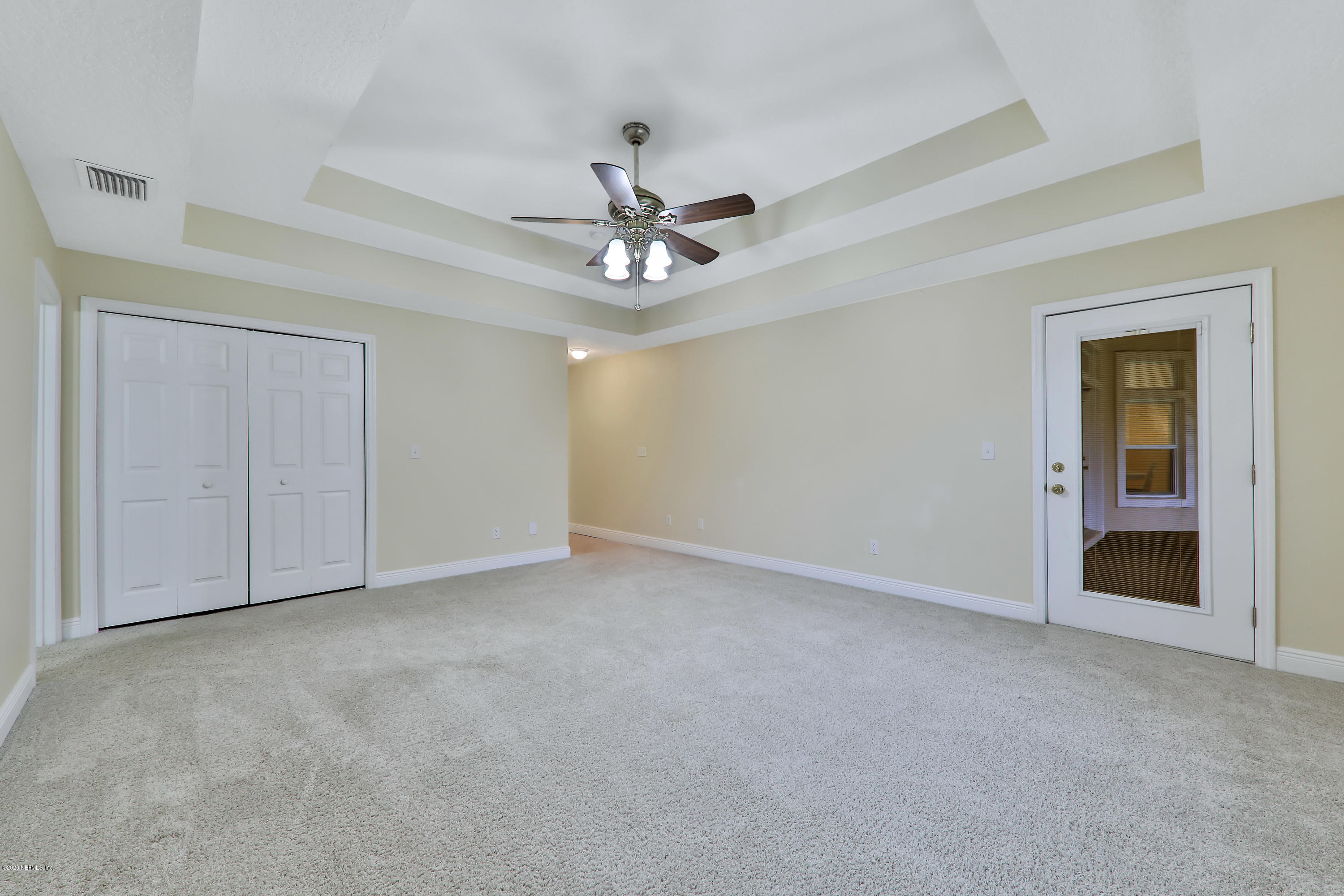 3289 Kings Road South St. Augustine, FL 32086 - Photo 14 of 41 a view of an empty room with a ceiling fan