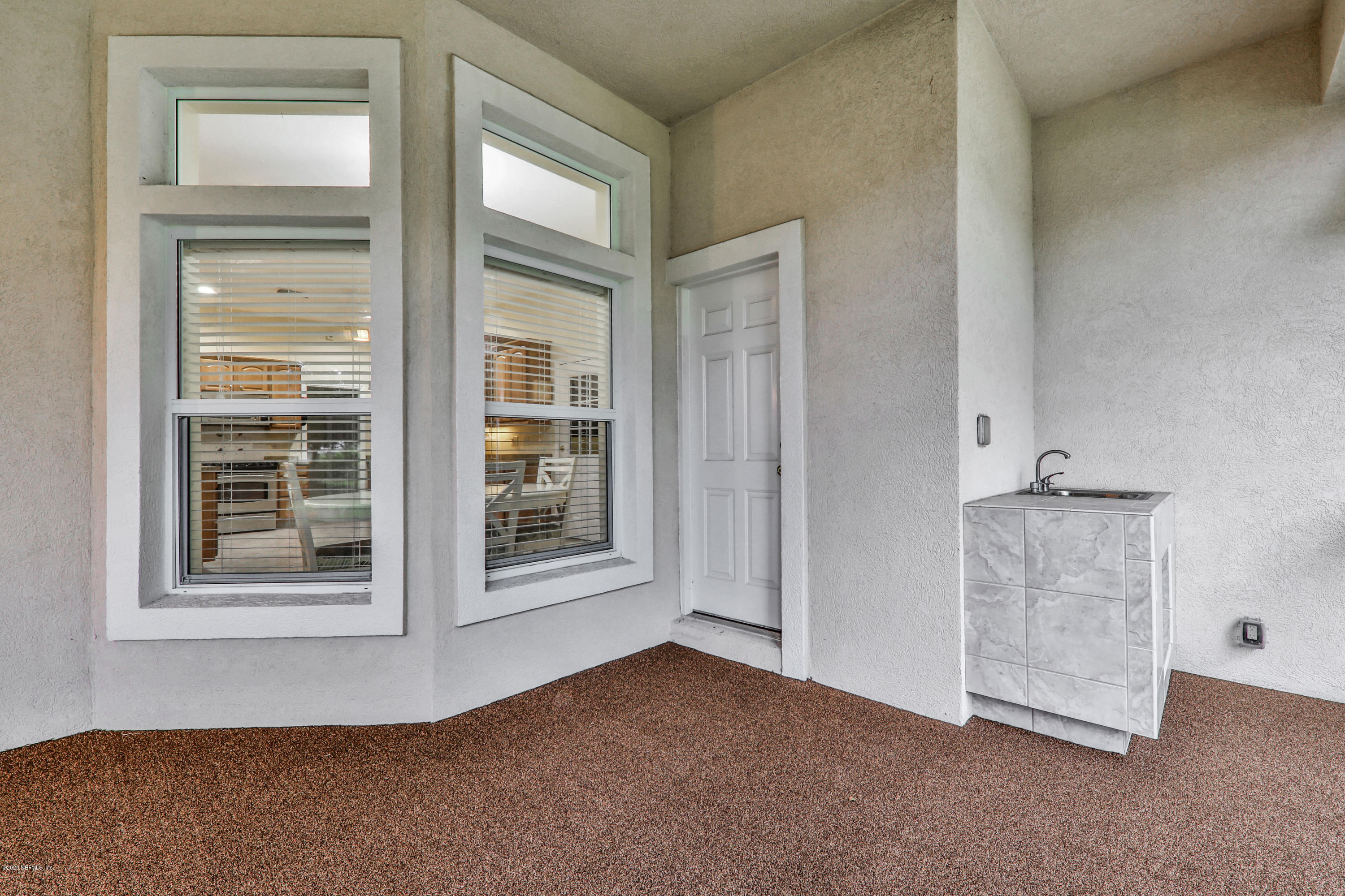 3289 Kings Road South St. Augustine, FL 32086 - Photo 35 of 41 an empty room with windows