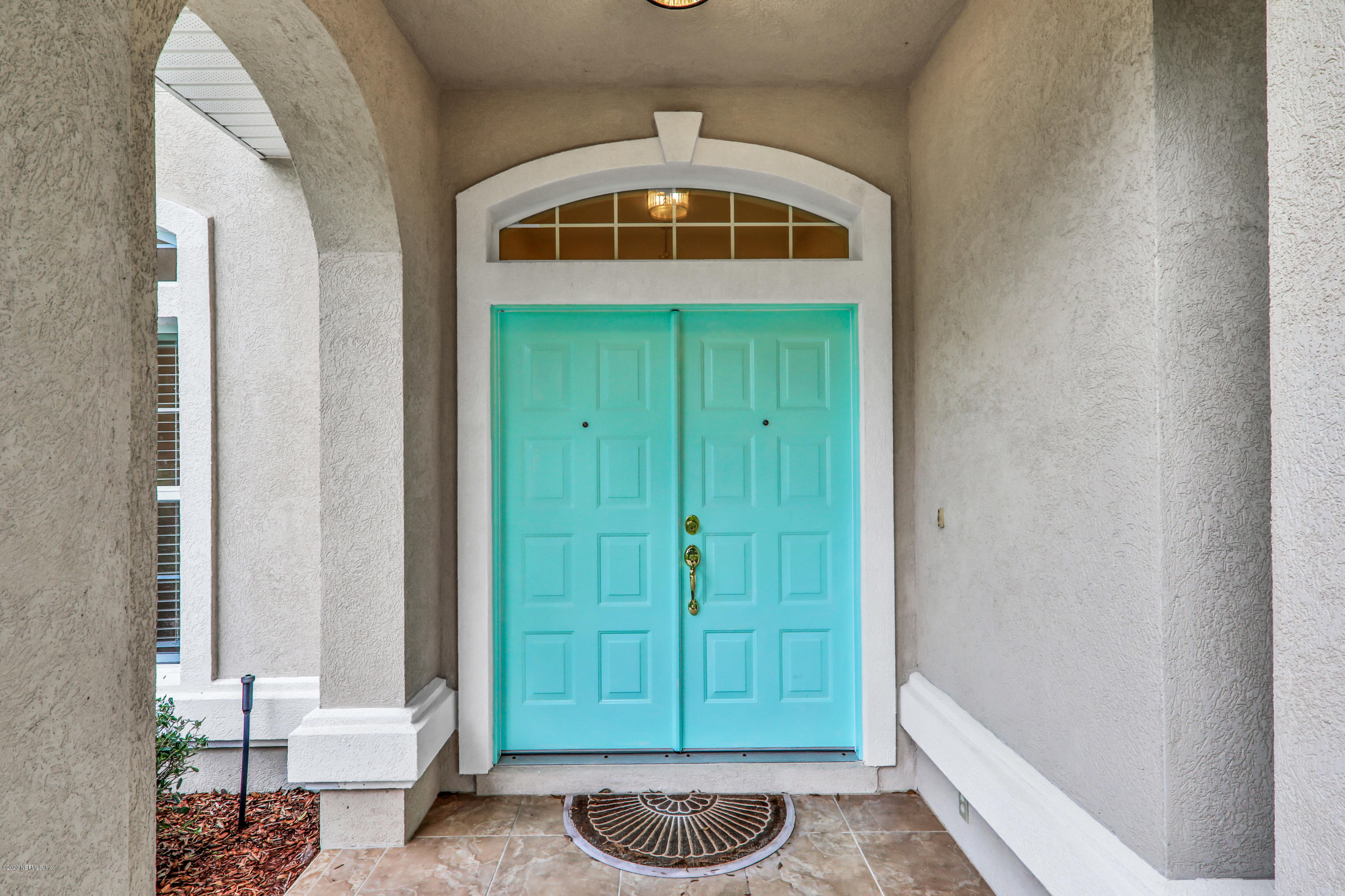 3289 Kings Road South St. Augustine, FL 32086 - Photo 38 of 41 a front view of a house with entryway