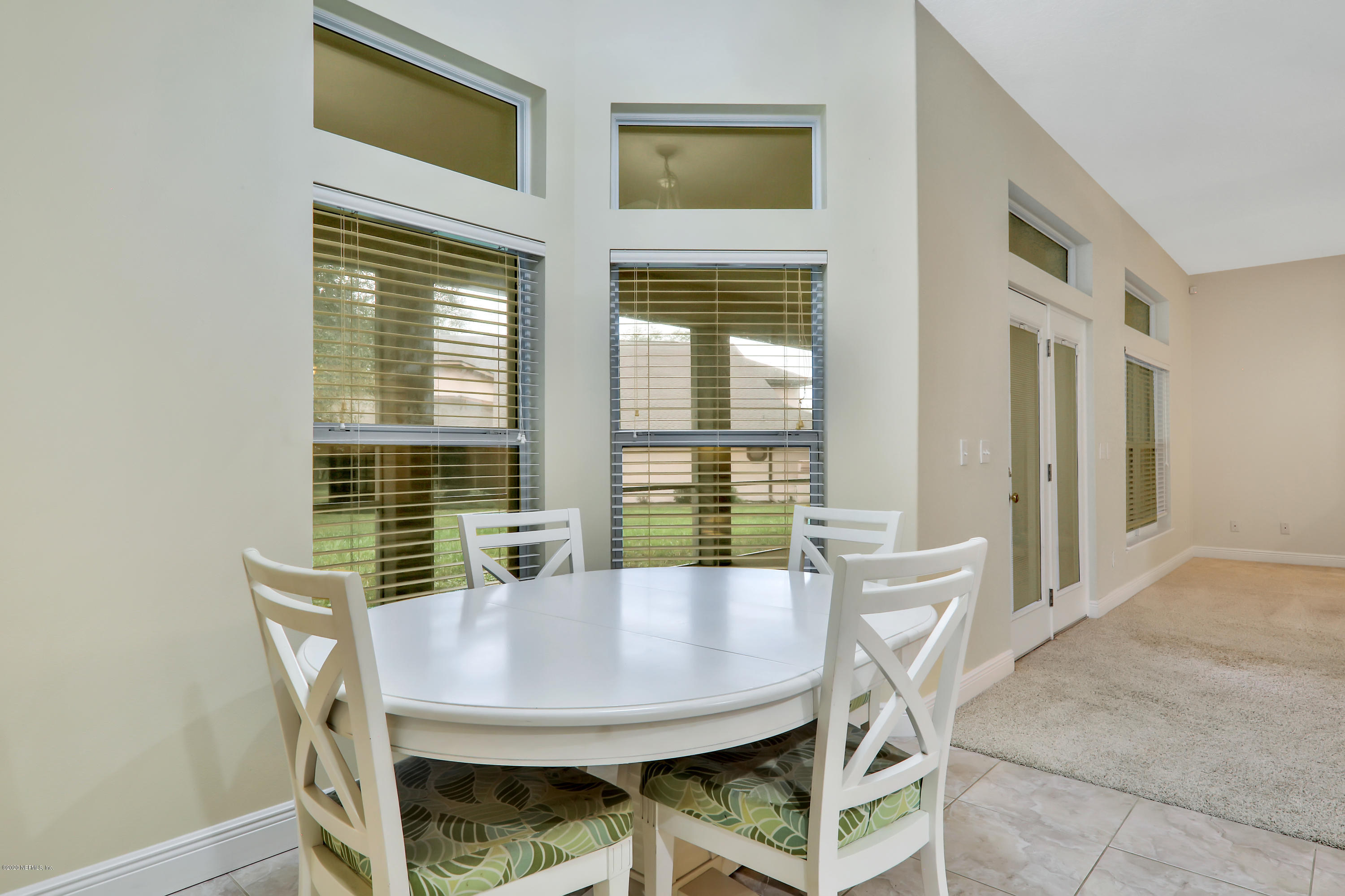 3289 Kings Road South St. Augustine, FL 32086 - Photo 5 of 41 a view of a dining room with furniture and window