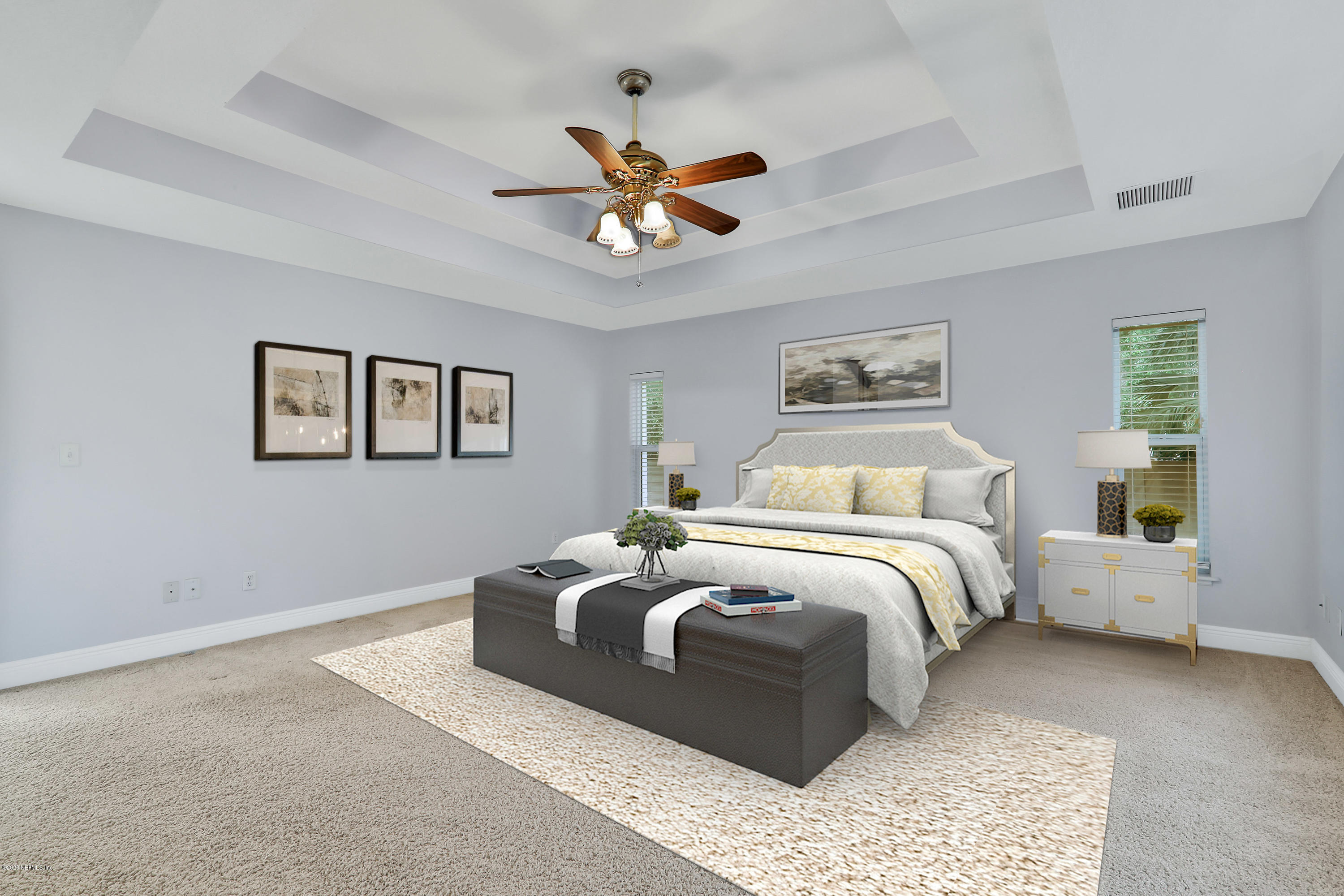 3289 Kings Road South St. Augustine, FL 32086 - Photo 7 of 41 a bedroom with a bed and a chandelier