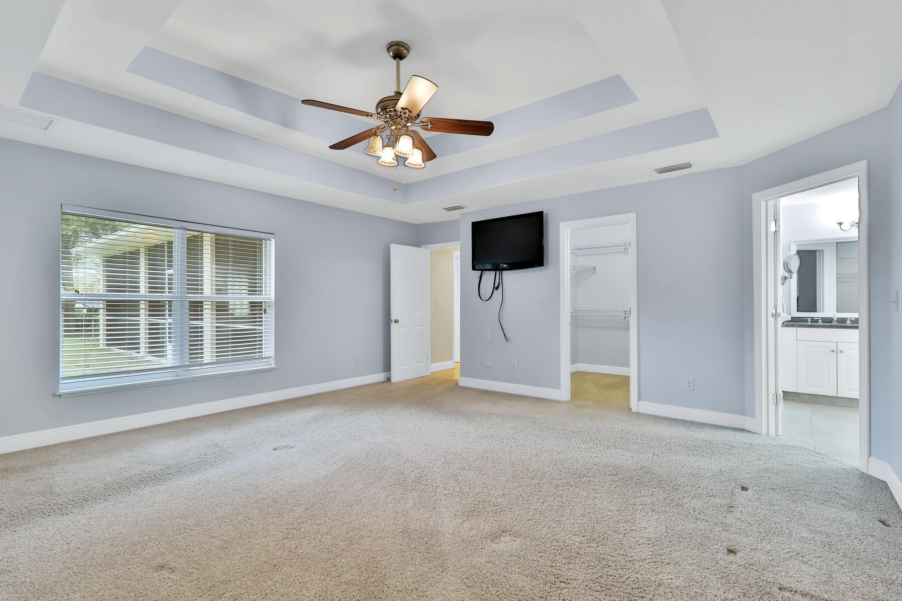 3289 Kings Road South St. Augustine, FL 32086 - Photo 8 of 41 a view of empty room with a ceiling fan and window