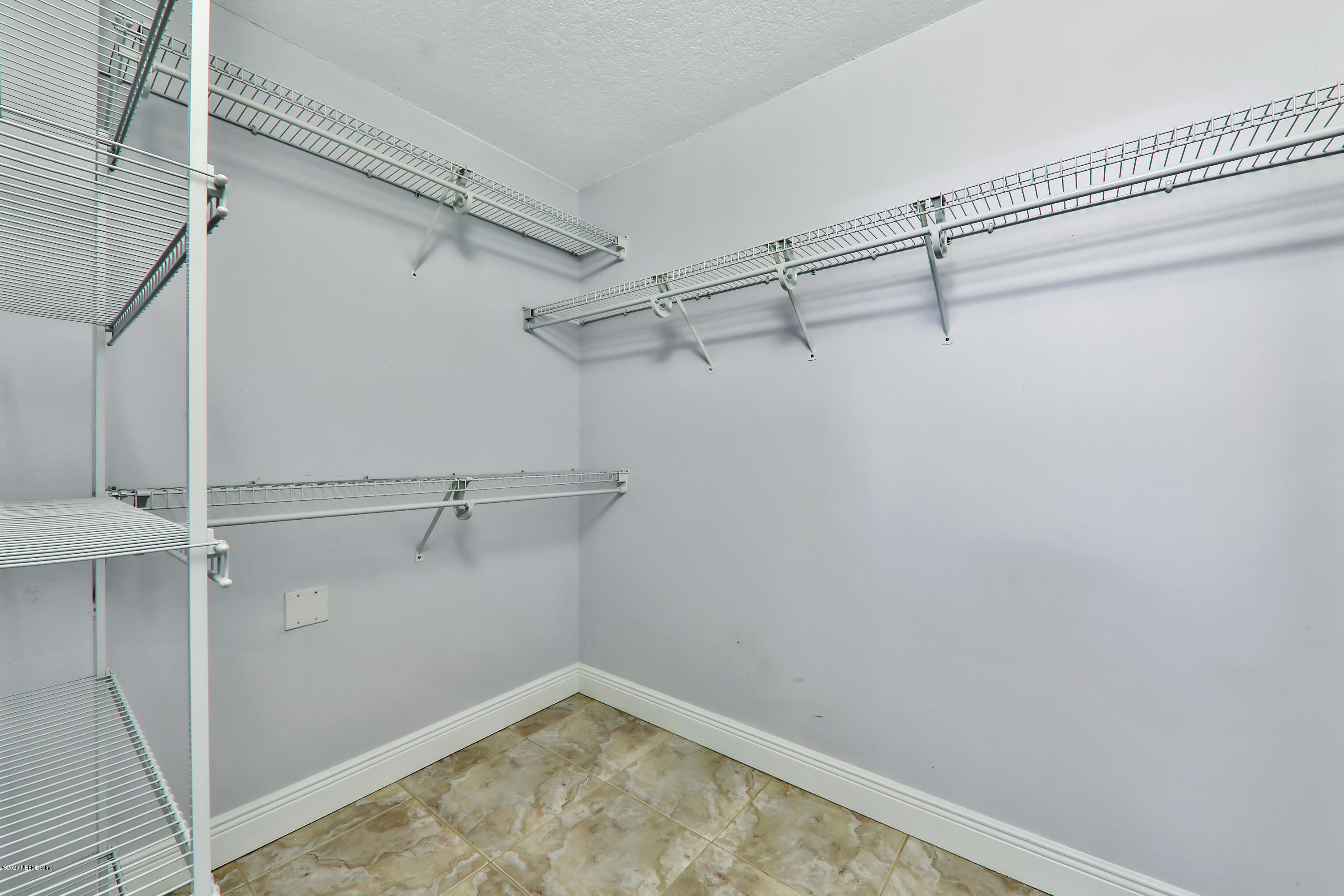 3289 Kings Road South St. Augustine, FL 32086 - Photo 10 of 41 a view of a room with racks on the wall