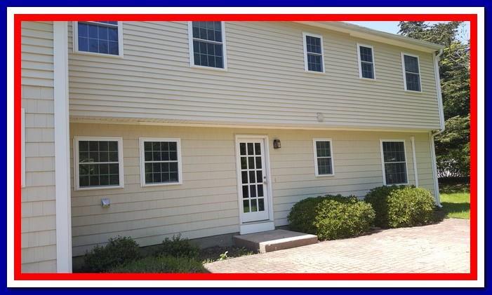 74 Flanders Road Stonington, CT 06378 - Photo 1 of 1 a view of the house and front door