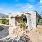 a front view of a house with a porch