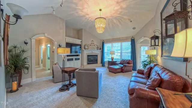 a bedroom with a bed dresser and a window