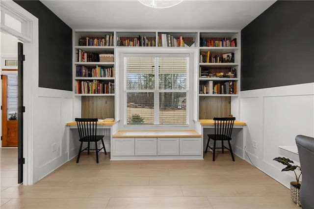 a kitchen with stainless steel appliances a sink stove and cabinets
