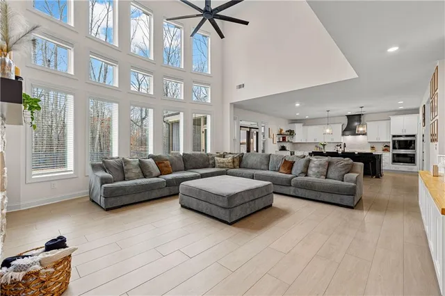 a kitchen with stainless steel appliances granite countertop a refrigerator and a stove