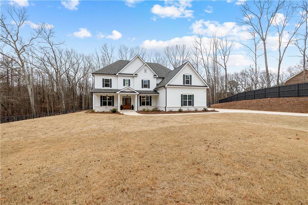 4895 Cool Springs Road Winston, GA 30187 - Photo 2 of 85 a front view of a house with a yard