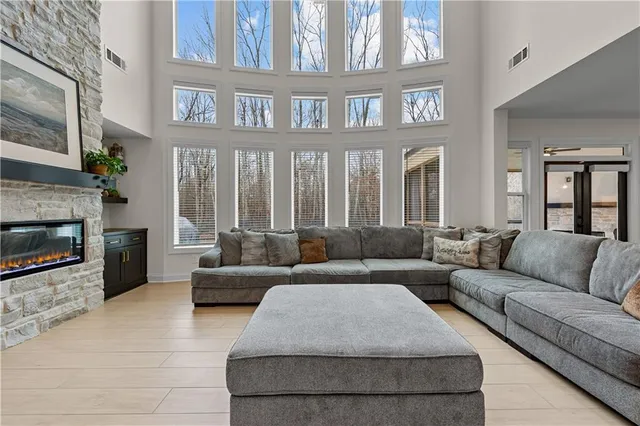 a bedroom with a bed and a couch