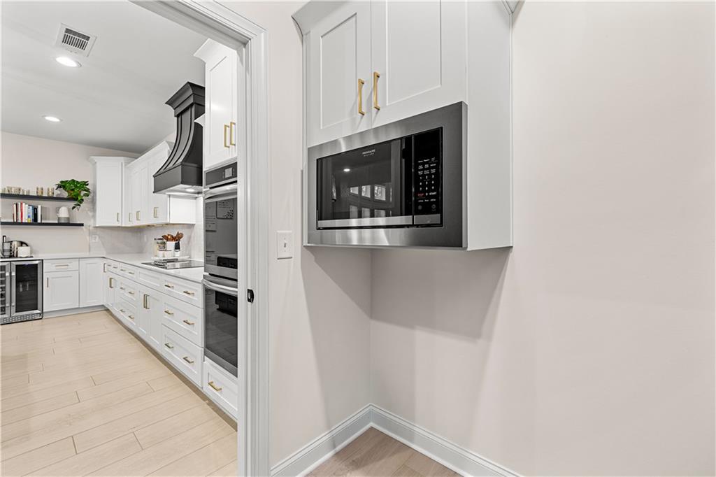4895 Cool Springs Road Winston, GA 30187 - Photo 32 of 85 a kitchen with stainless steel appliances granite countertop a refrigerator and a stove