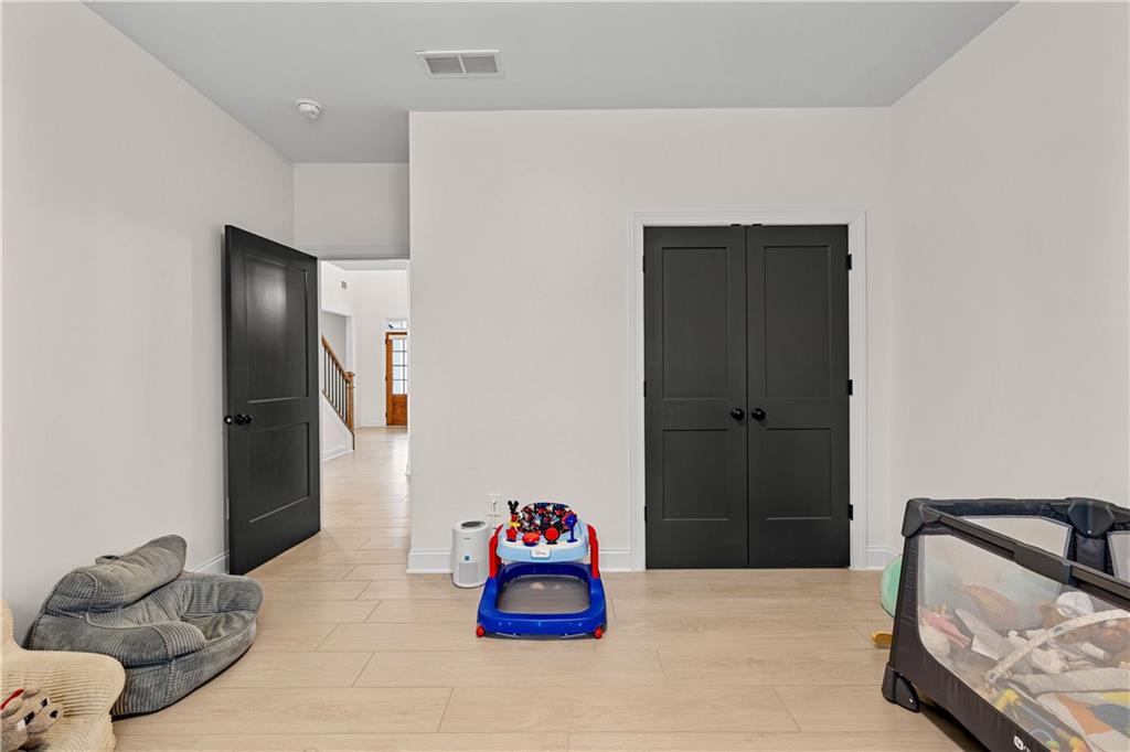 4895 Cool Springs Road Winston, GA 30187 - Photo 34 of 85 a bedroom with a bed and a couch