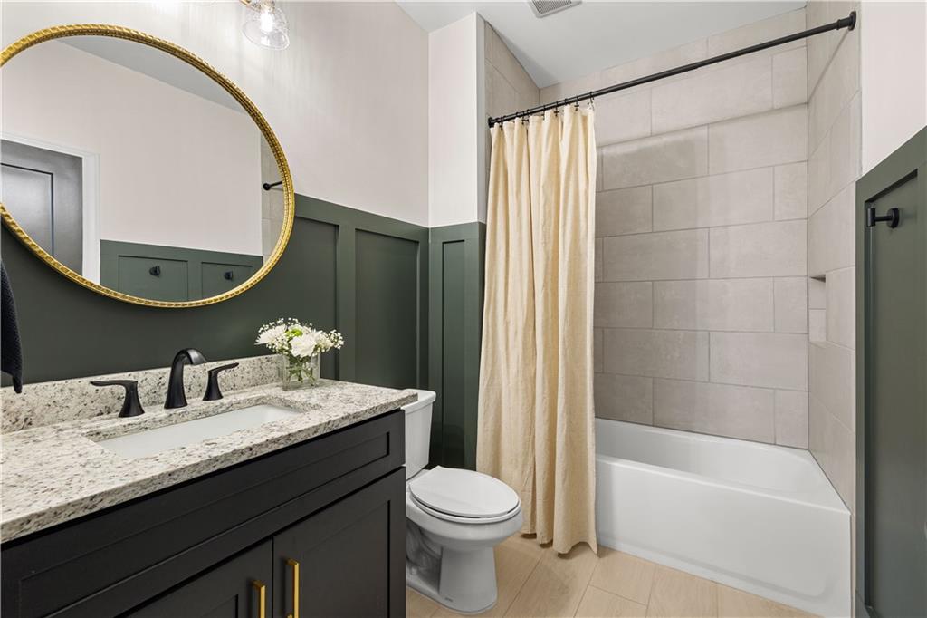 4895 Cool Springs Road Winston, GA 30187 - Photo 35 of 85 a bathroom with a granite countertop sink toilet and a mirror