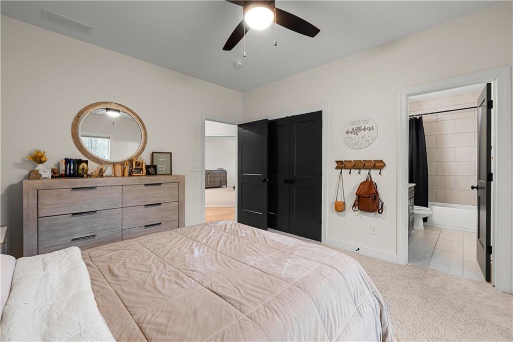 4895 Cool Springs Road Winston, GA 30187 - Photo 53 of 85 a bedroom with a bed and a dresser