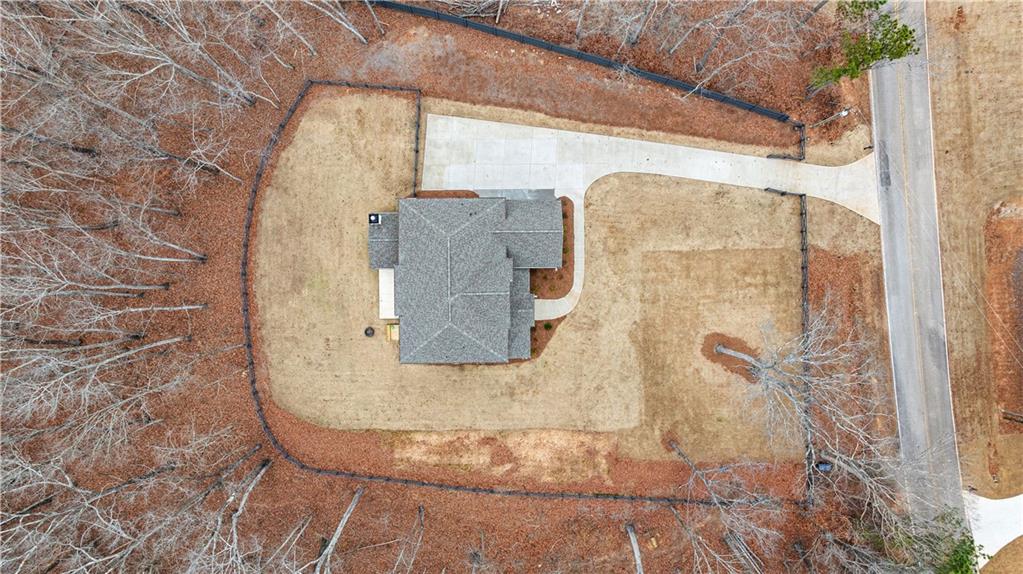 4895 Cool Springs Road Winston, GA 30187 - Photo 76 of 85 a bathroom with a granite countertop shower and a mirror