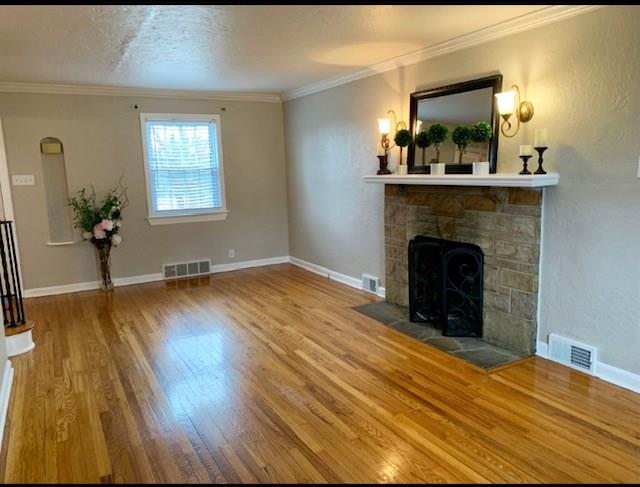 4707 Curry Road Whitehall, PA 15236 - Photo 2 of 19 Living Room W/Gleaming Hardwood Floors & Log Burning Fireplace.22'x12'