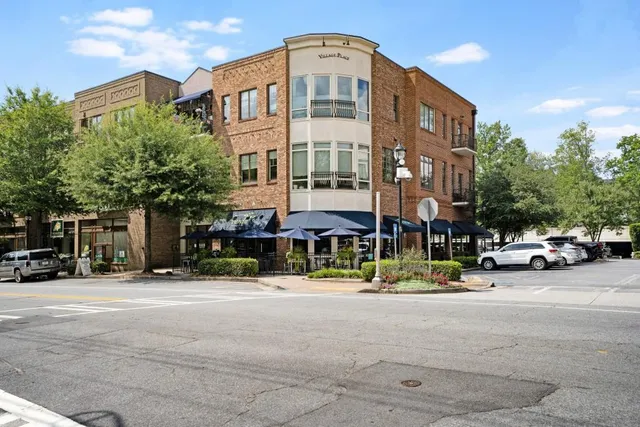 a front view of a building with street view