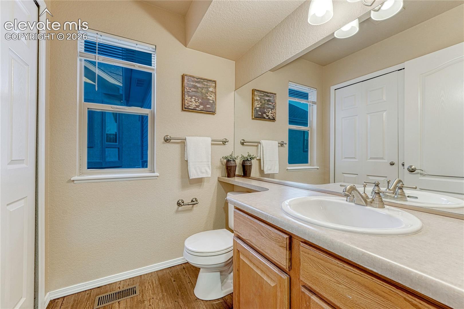 2413 Cinnabar Road Colorado Springs, CO 80921 - Photo 32 of 50 Half Bath/Laundry on the main