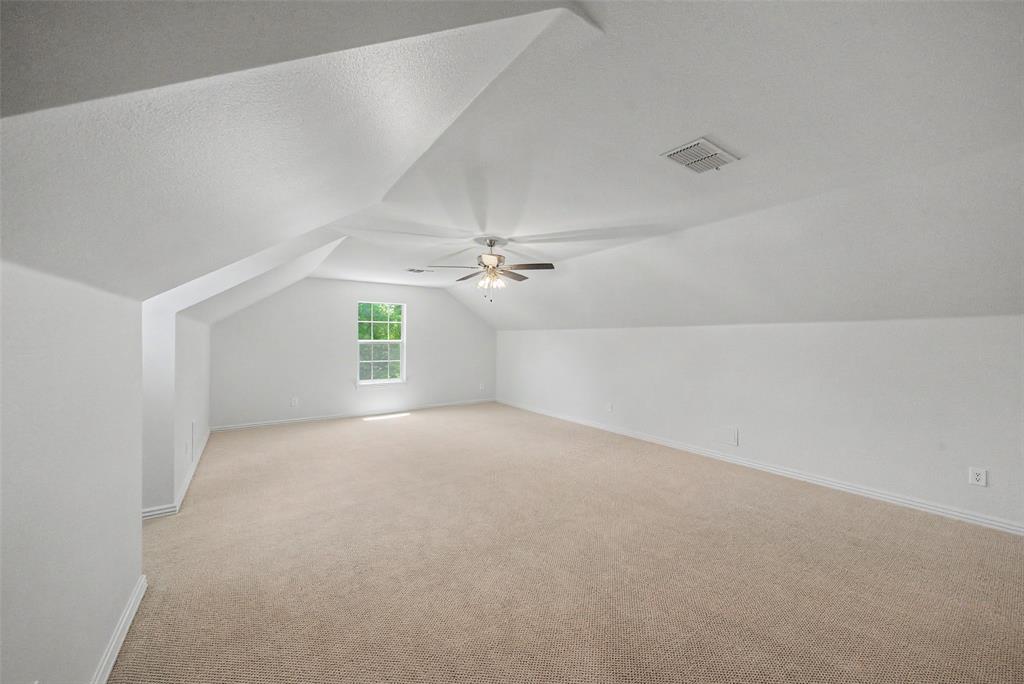 1200 Mount Gilead Road Keller, TX 76262 - Photo 31 of 38 an empty room with windows and ceiling fan