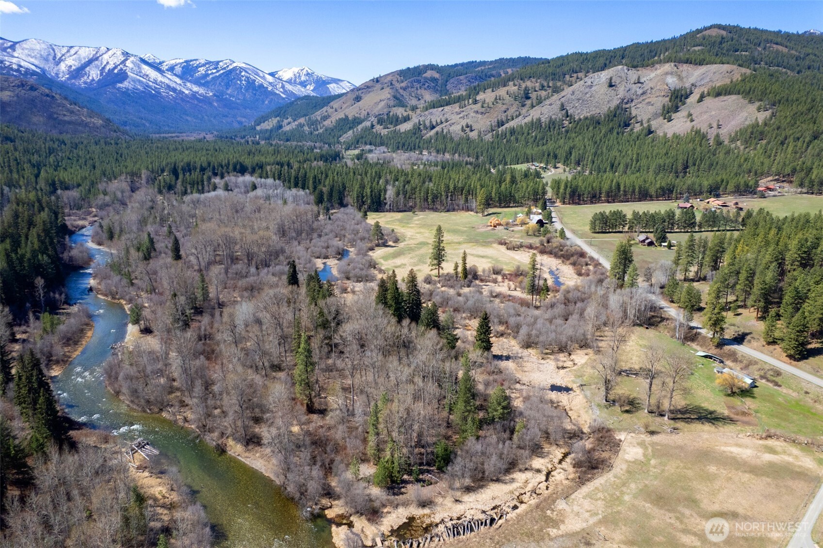 929 A Twisp River Road Twisp, WA 98856 - Photo 1 of 19 a view of a lot of trees and mountains