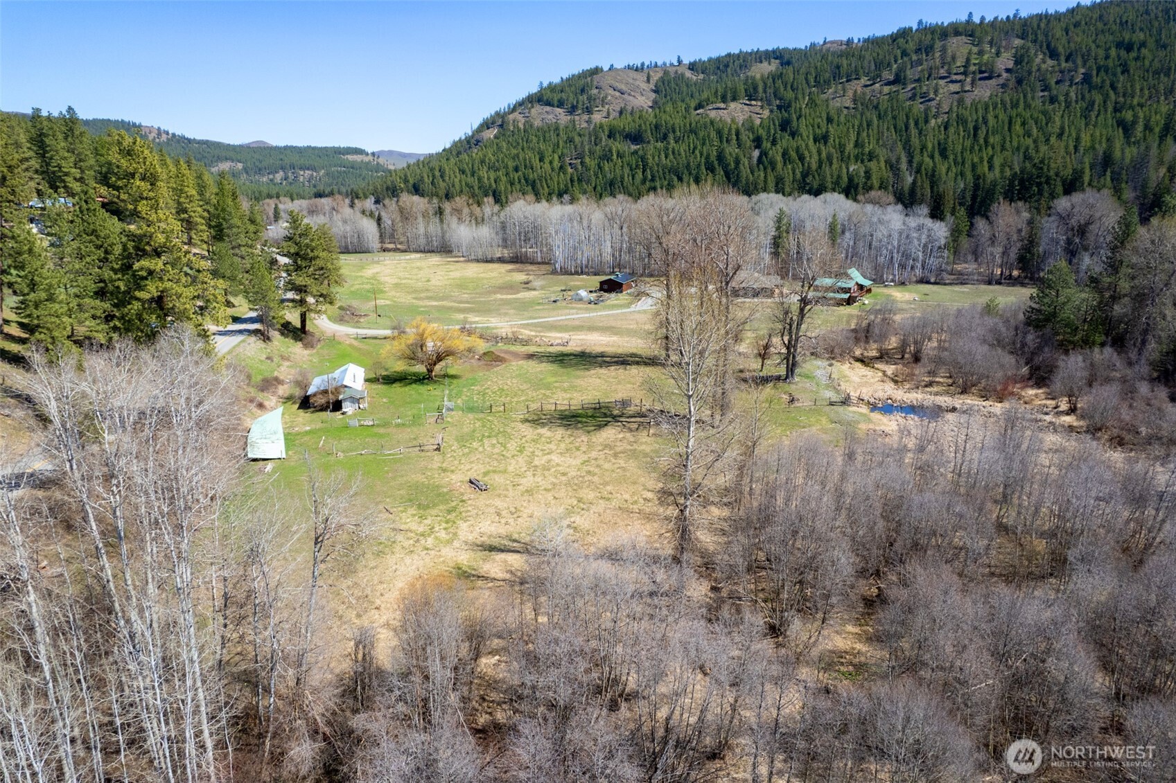 929 A Twisp River Road Twisp, WA 98856 - Photo 11 of 19 a view of a lake with houses