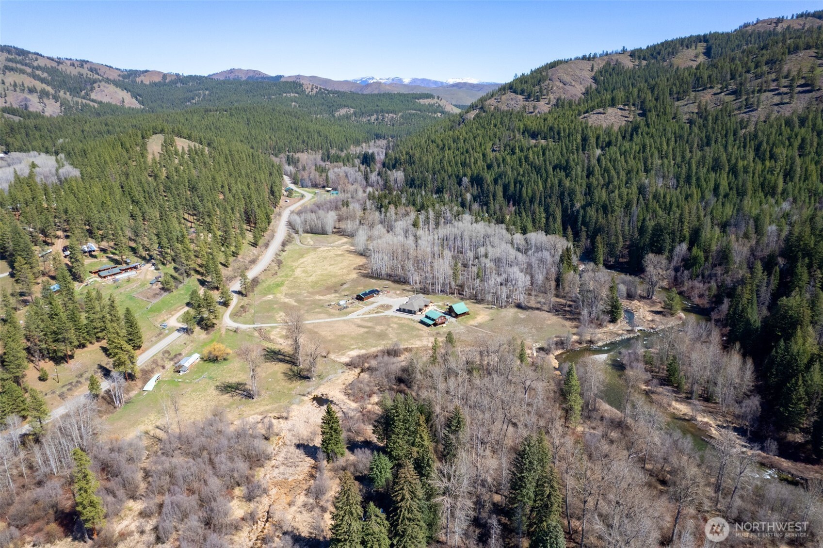 929 A Twisp River Road Twisp, WA 98856 - Photo 12 of 19 a view of a town with mountains in the background