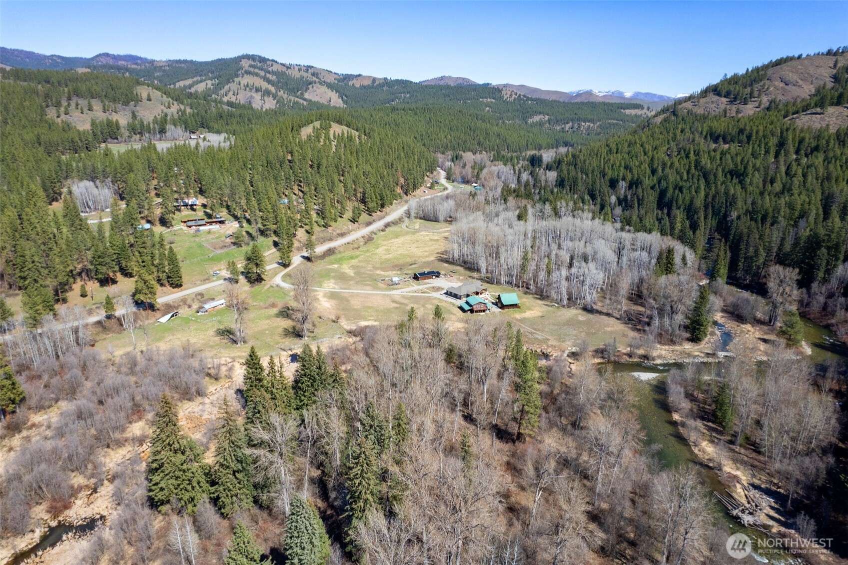 929 A Twisp River Road Twisp, WA 98856 - Photo 13 of 19 a view of a town with mountains in the background