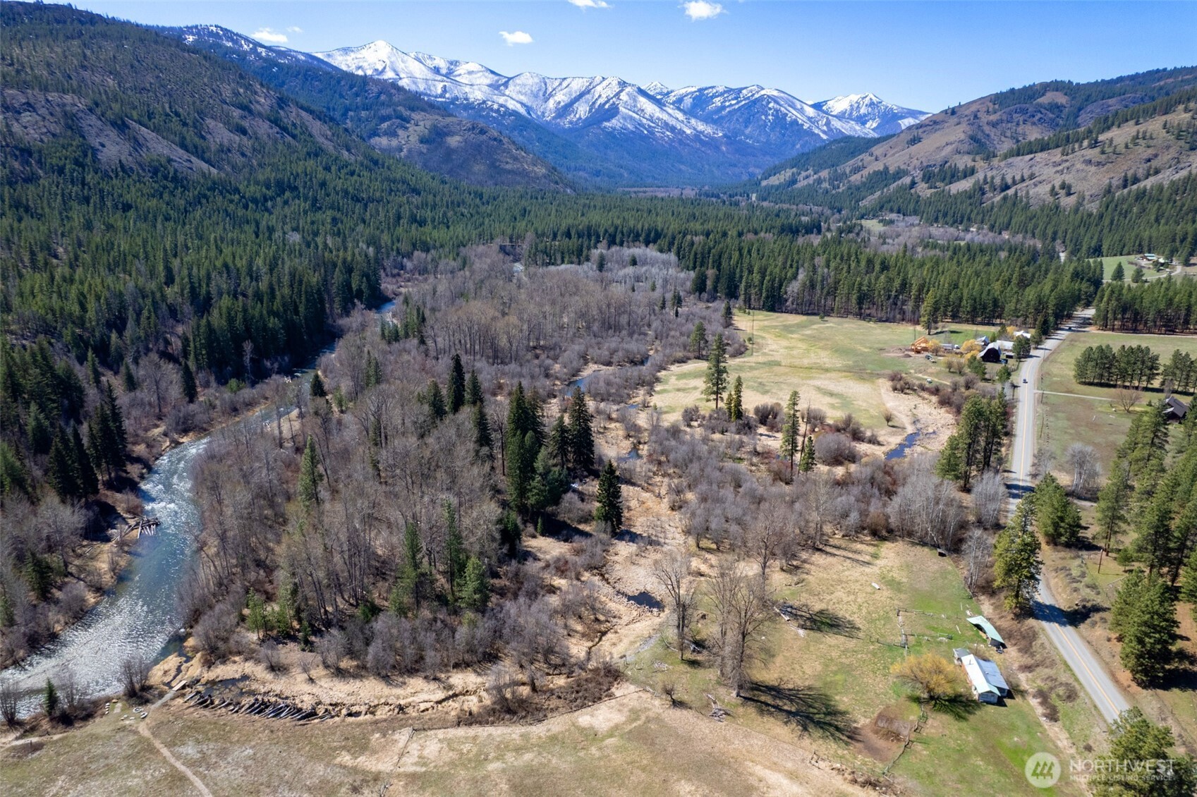 929 A Twisp River Road Twisp, WA 98856 - Photo 18 of 19 a view of a backyard with mountain view