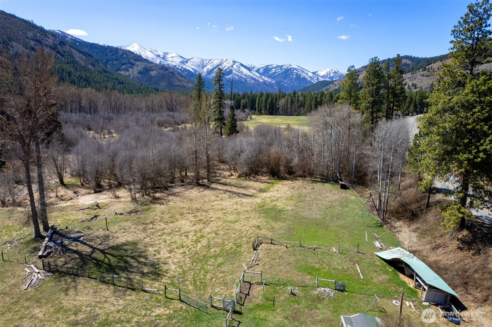 929 A Twisp River Road Twisp, WA 98856 - Photo 4 of 19 a view of a backyard of a house